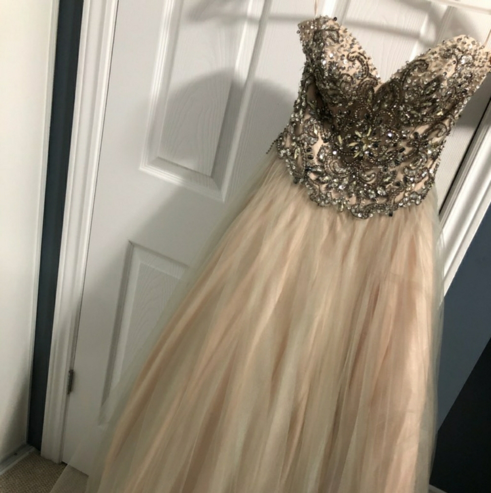 Stunning sweet heart neckline beaded bodice gown